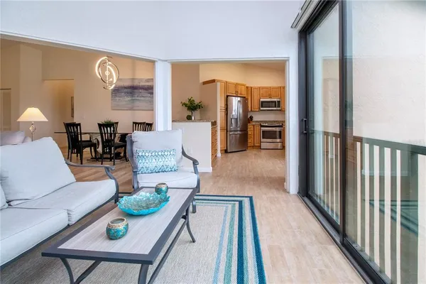 a living room with furniture and a table