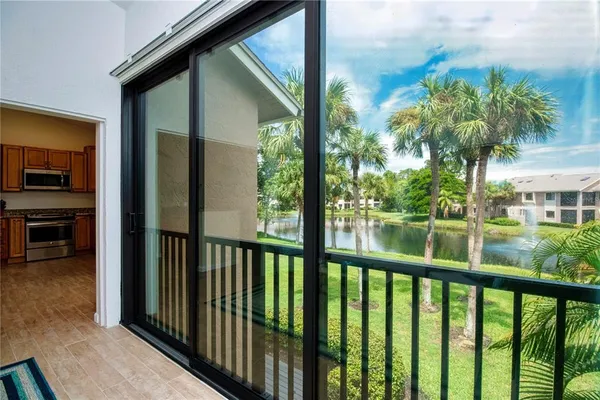 a view of a balcony with lake view
