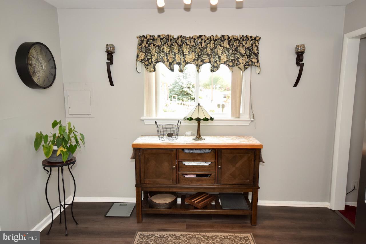 2419 Secane Road Secane, PA 19018 - Photo 15 of 46 a bathroom with a sink a mirror and a window