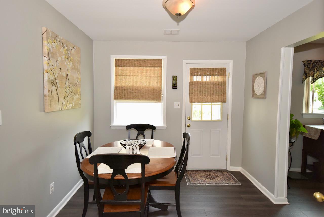 2419 Secane Road Secane, PA 19018 - Photo 16 of 46 a view of a dining room with furniture and chandelier