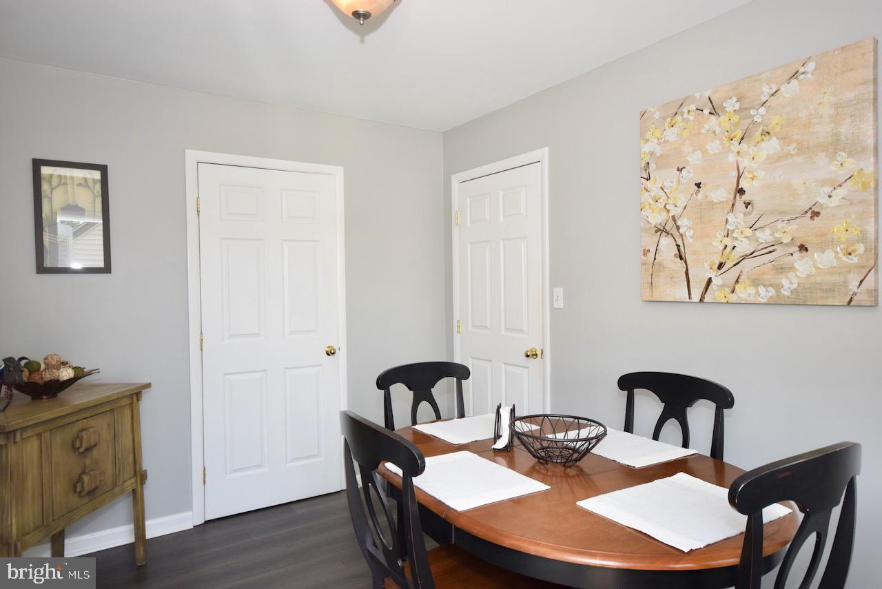 2419 Secane Road Secane, PA 19018 - Photo 18 of 46 a view of a dining room with furniture and wooden floor