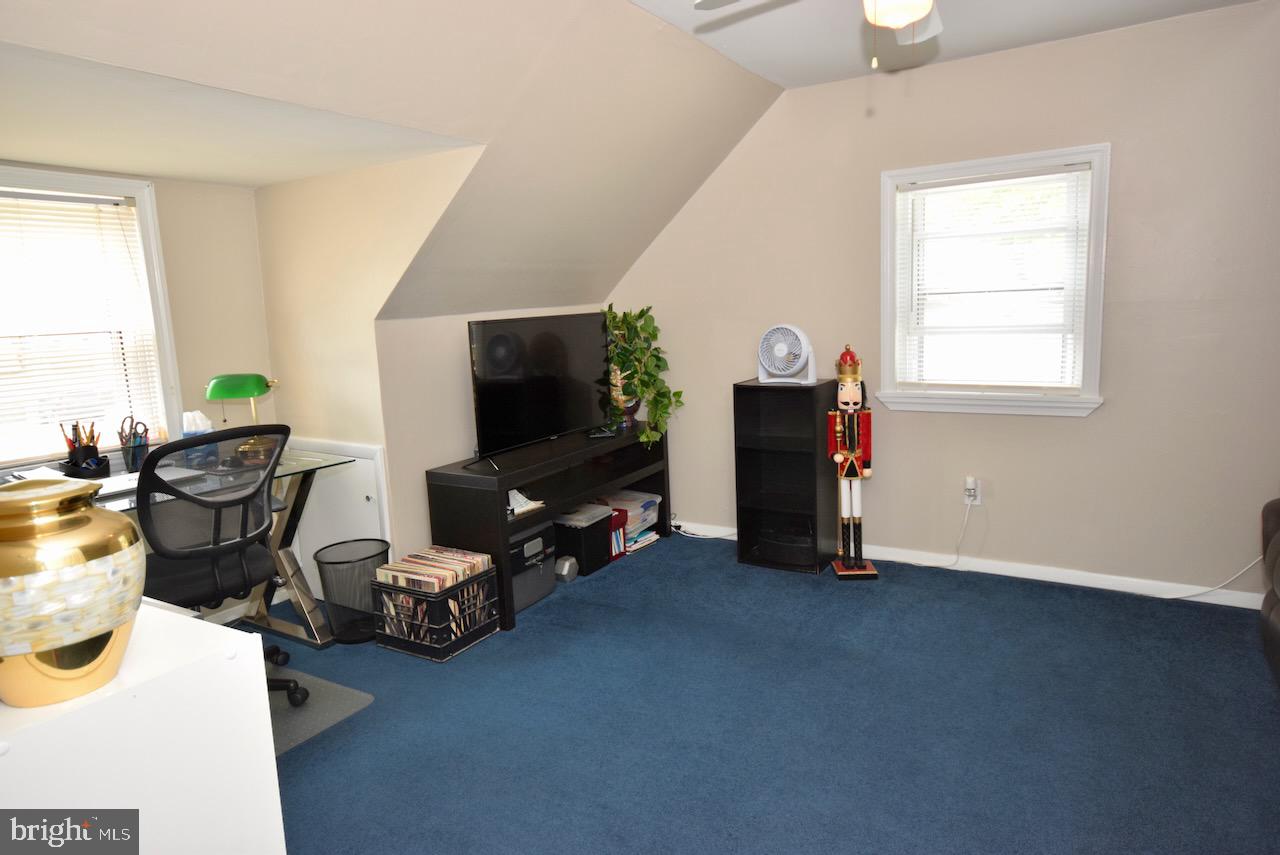 2419 Secane Road Secane, PA 19018 - Photo 34 of 46 a living room with furniture and a flat screen tv