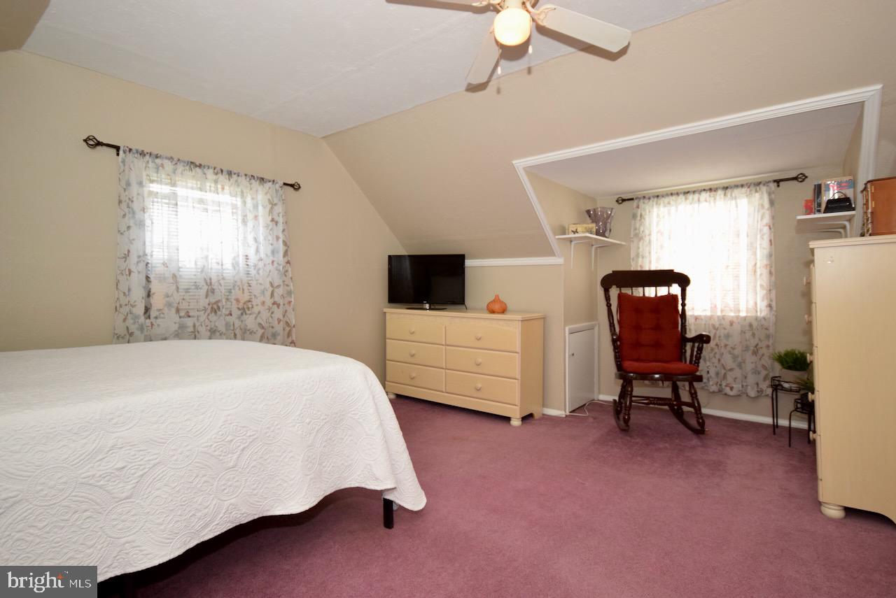 2419 Secane Road Secane, PA 19018 - Photo 36 of 46 a bedroom with a bed chair and window