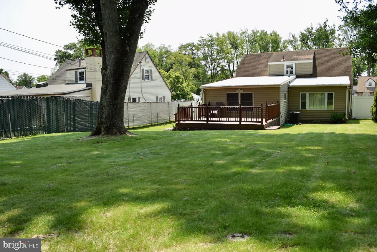 2419 Secane Road Secane, PA 19018 - Photo 46 of 46 a front view of a house with garden