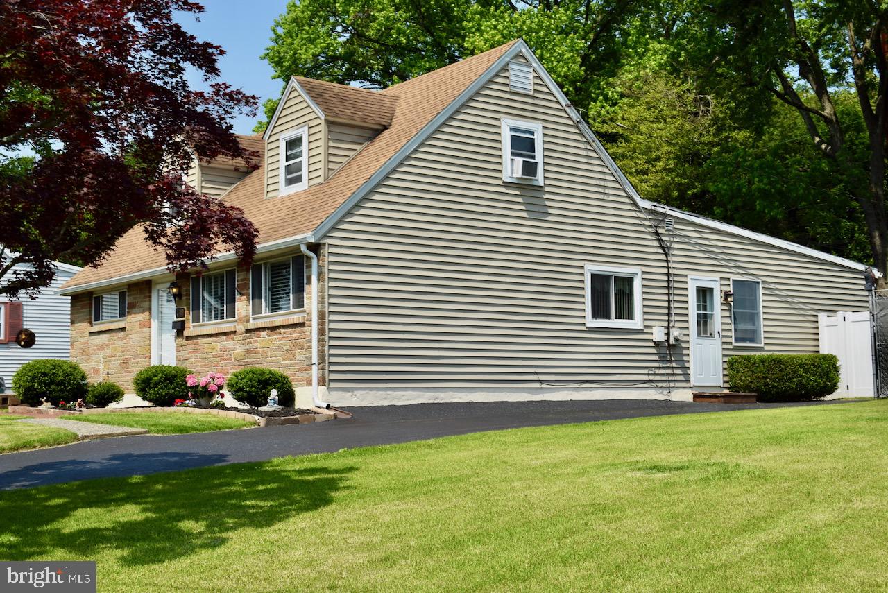2419 Secane Road Secane, PA 19018 - Photo 5 of 46 a view of a house with a yard