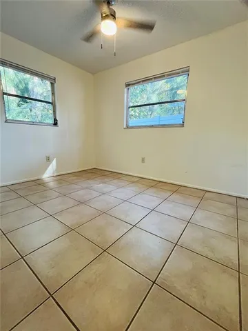 a view of a room with windows