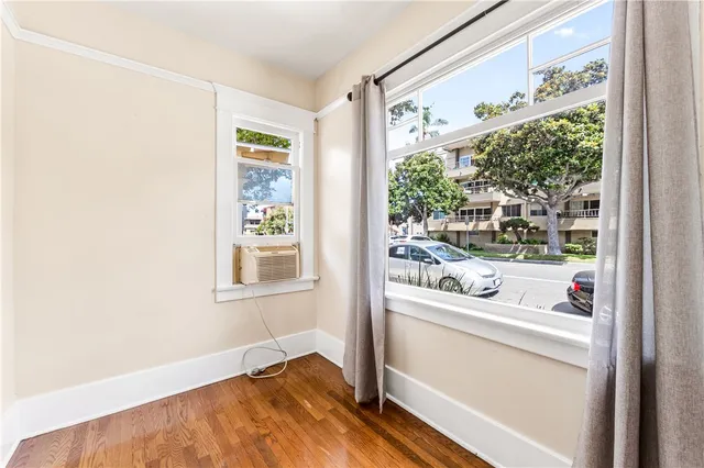 a room with a bed and a window