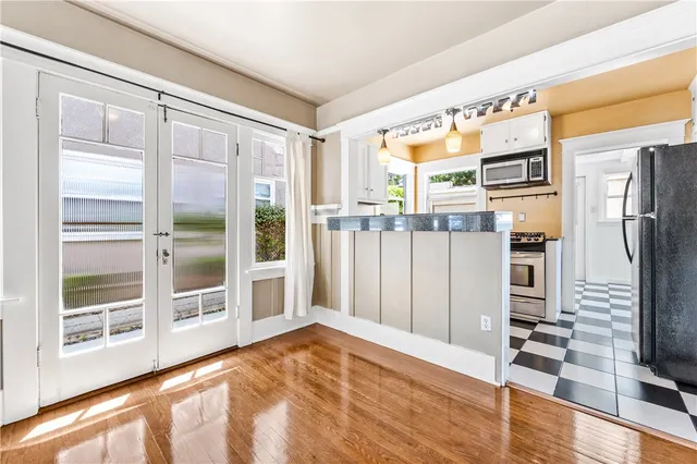 a view of a living room with a large window