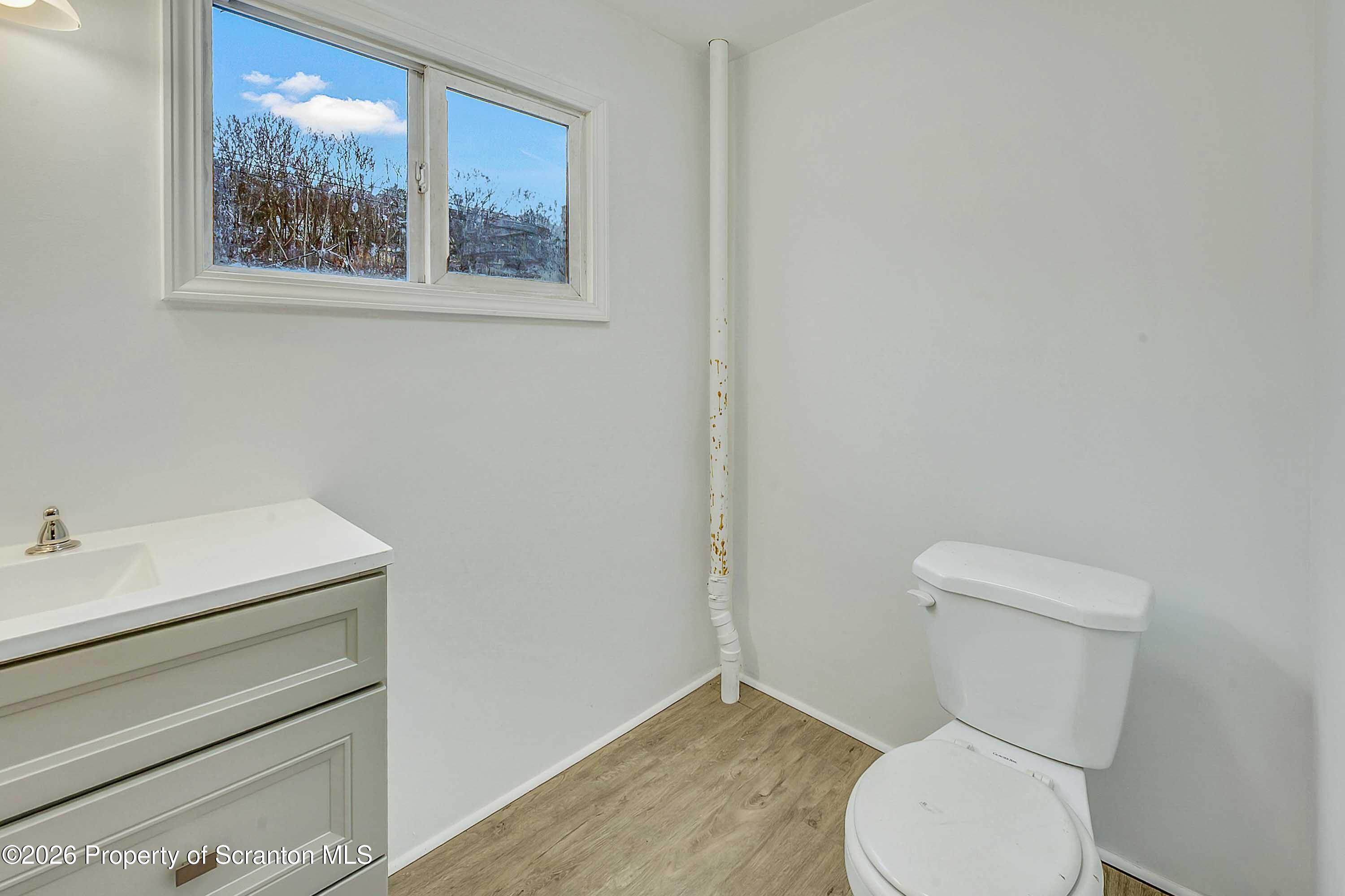 602 Main Street Archbald, PA 18403 - Photo 16 of 26 a bathroom with a toilet