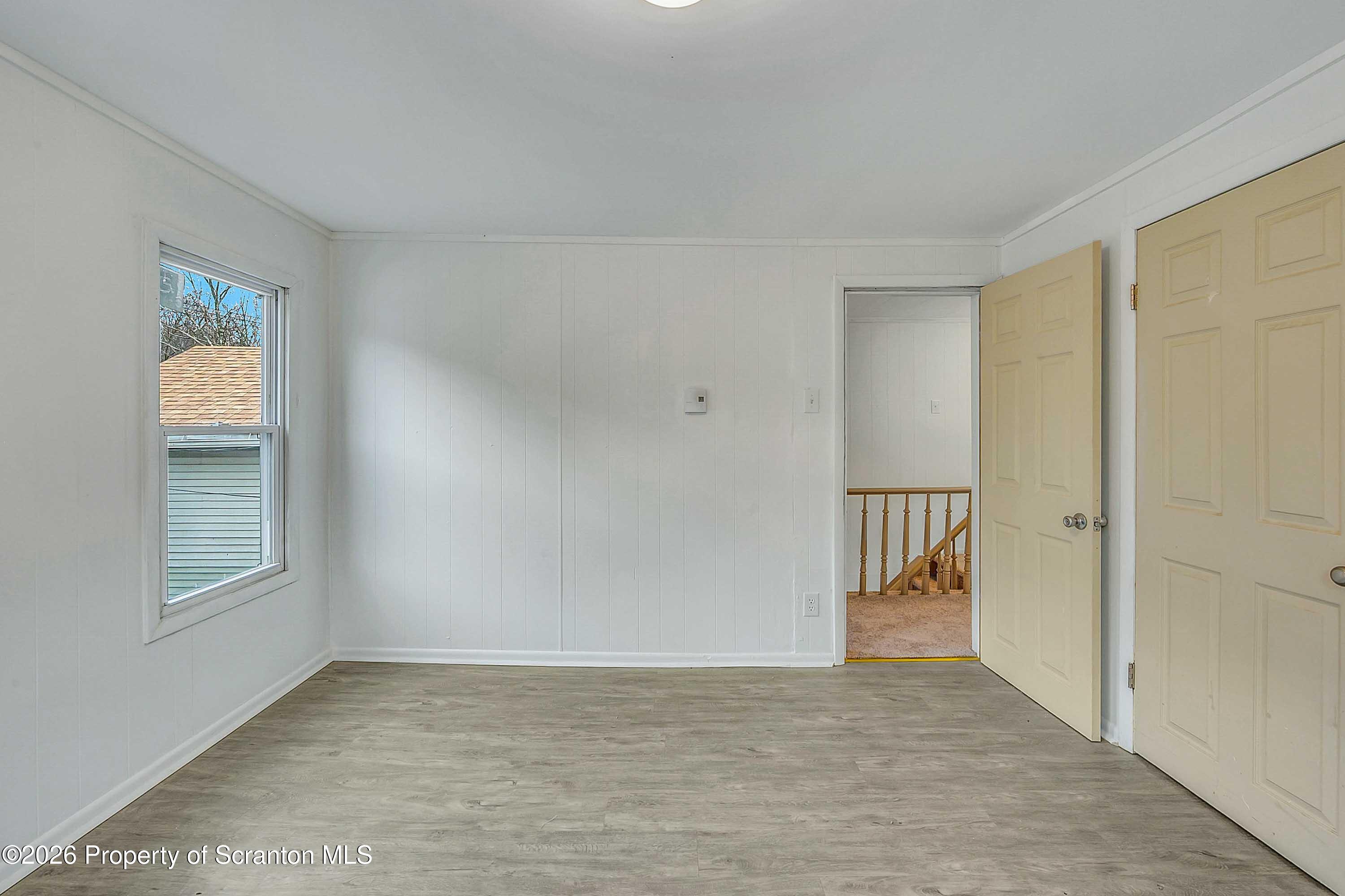 602 Main Street Archbald, PA 18403 - Photo 18 of 26 a view of an empty room and window