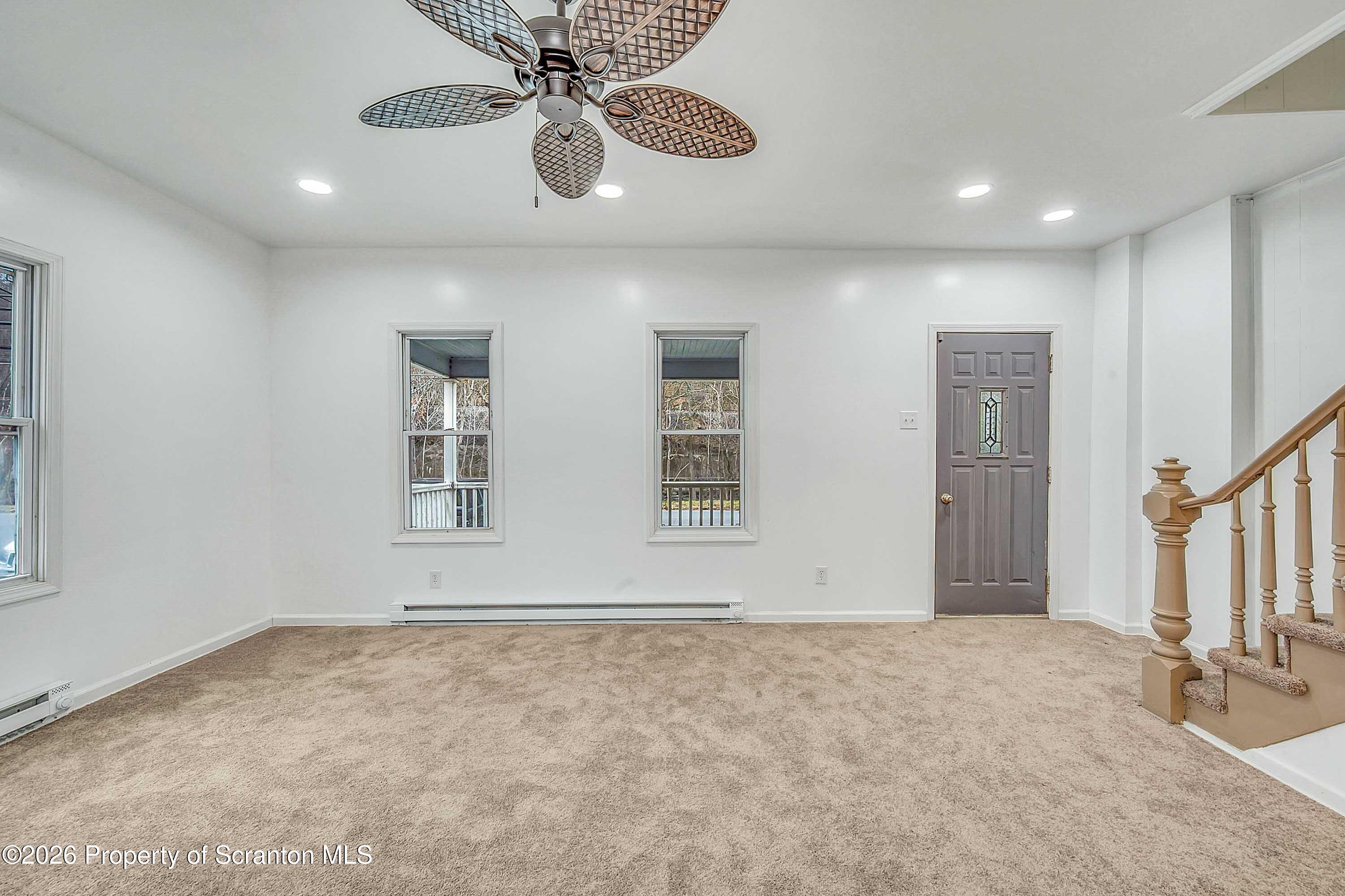 602 Main Street Archbald, PA 18403 - Photo 6 of 26 a view of an empty room with a window
