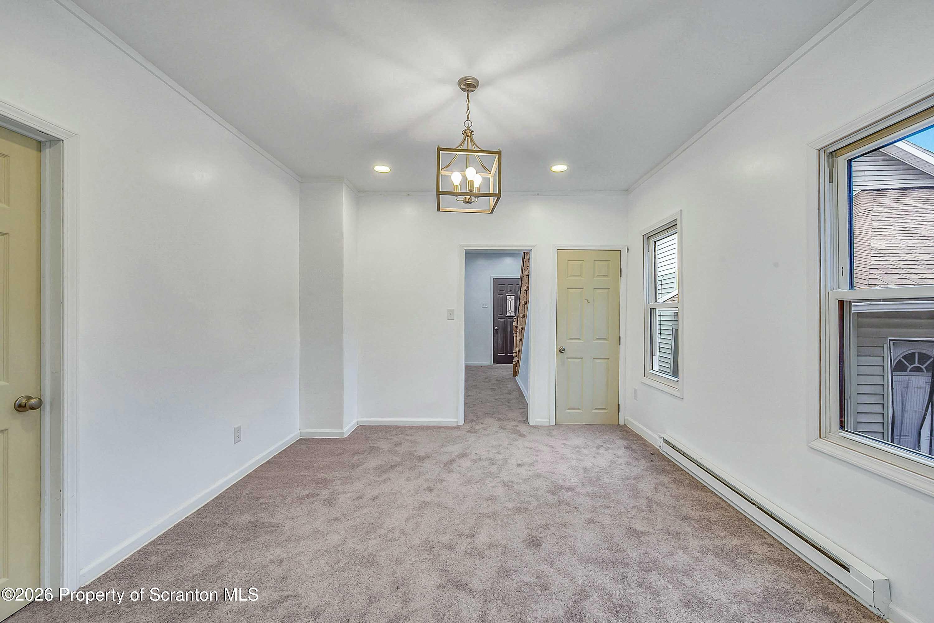 602 Main Street Archbald, PA 18403 - Photo 7 of 26 a view of a hallway with windows