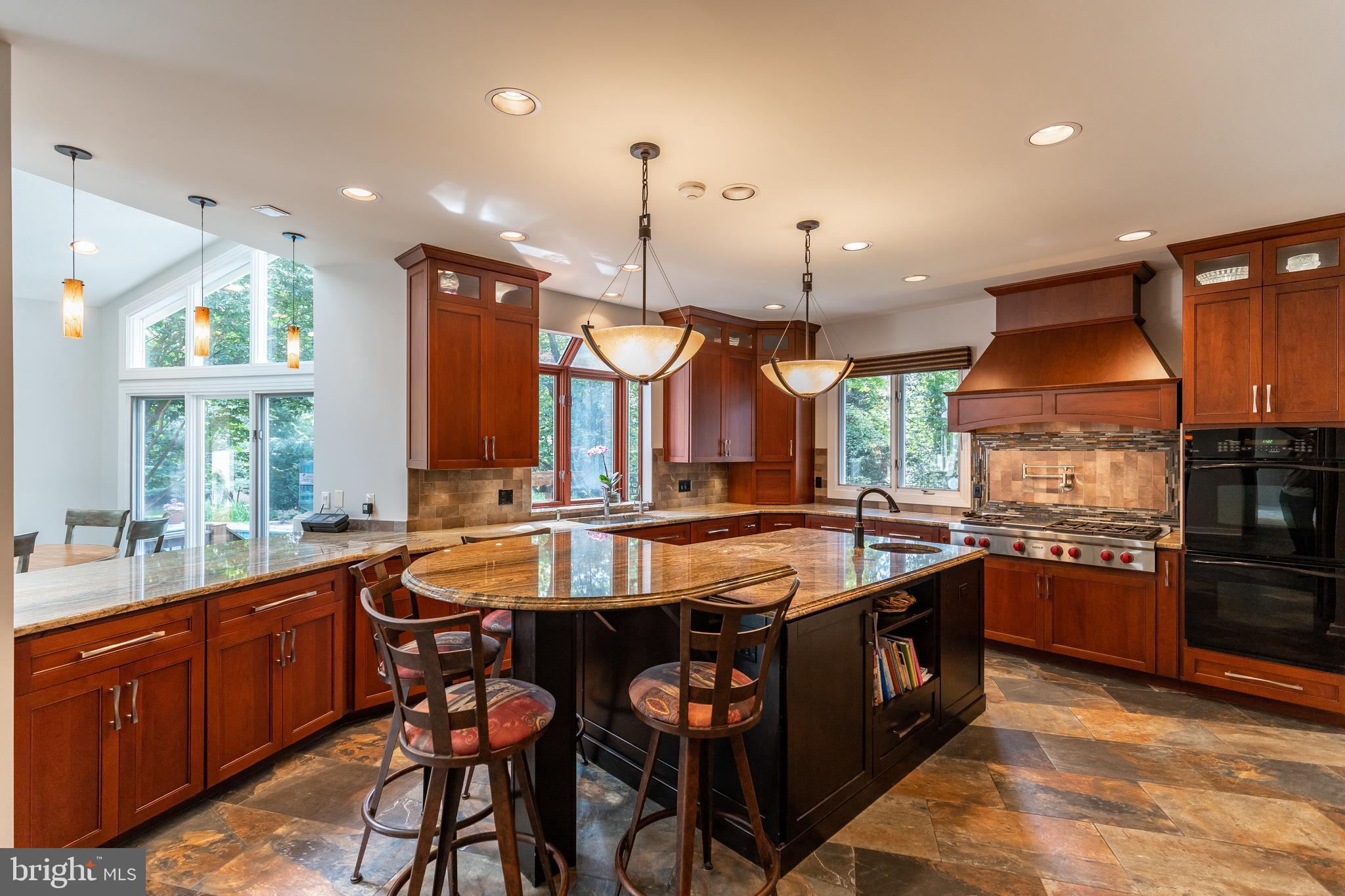 9129 Persimmon Tree Road Potomac, MD 20854 - Photo 11 of 51 Breakfast Bar, Wet Bar & Multiple Serving Areas