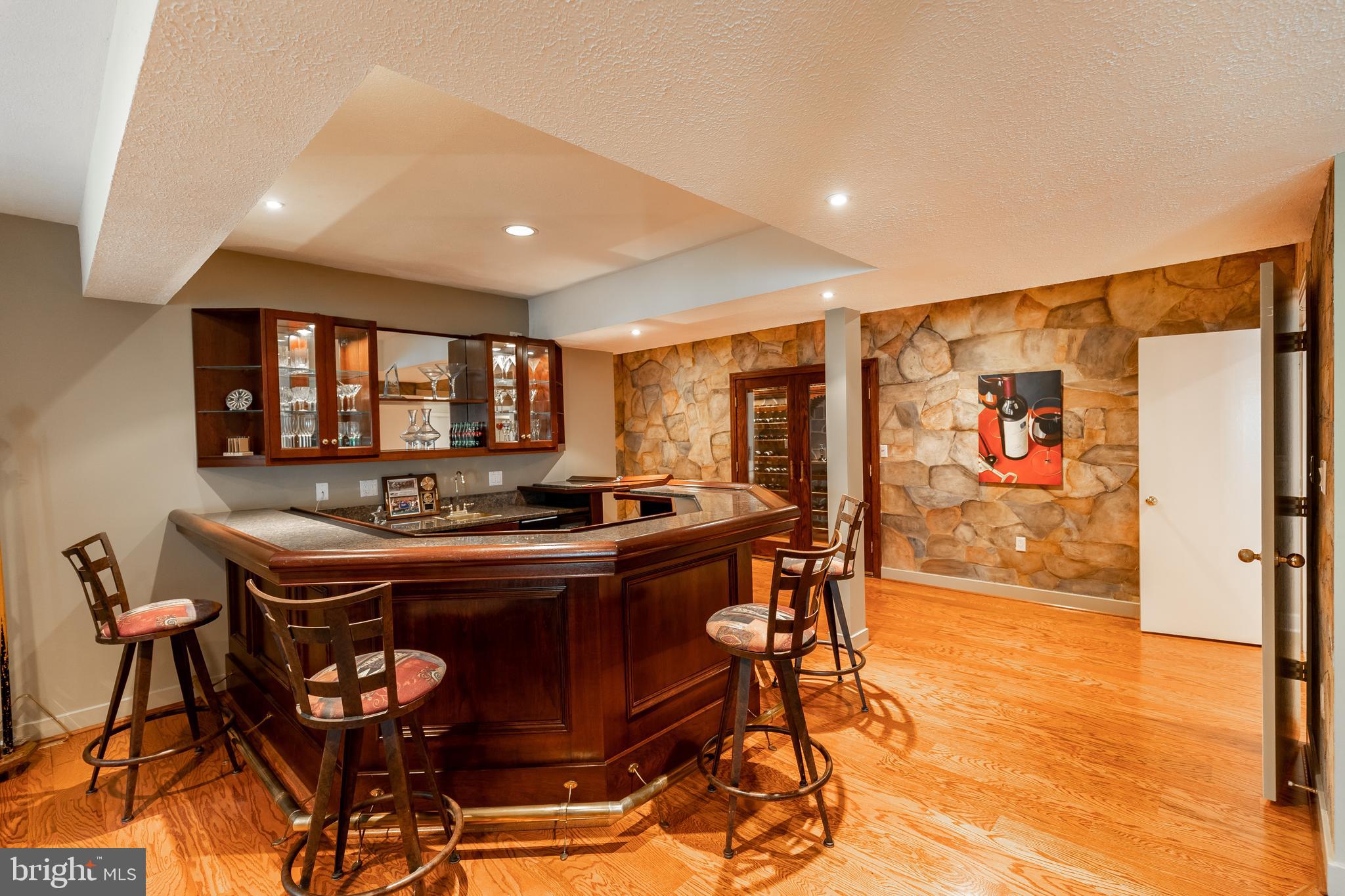 9129 Persimmon Tree Road Potomac, MD 20854 - Photo 39 of 51 Great Parties Happen at This Seated Wet Bar