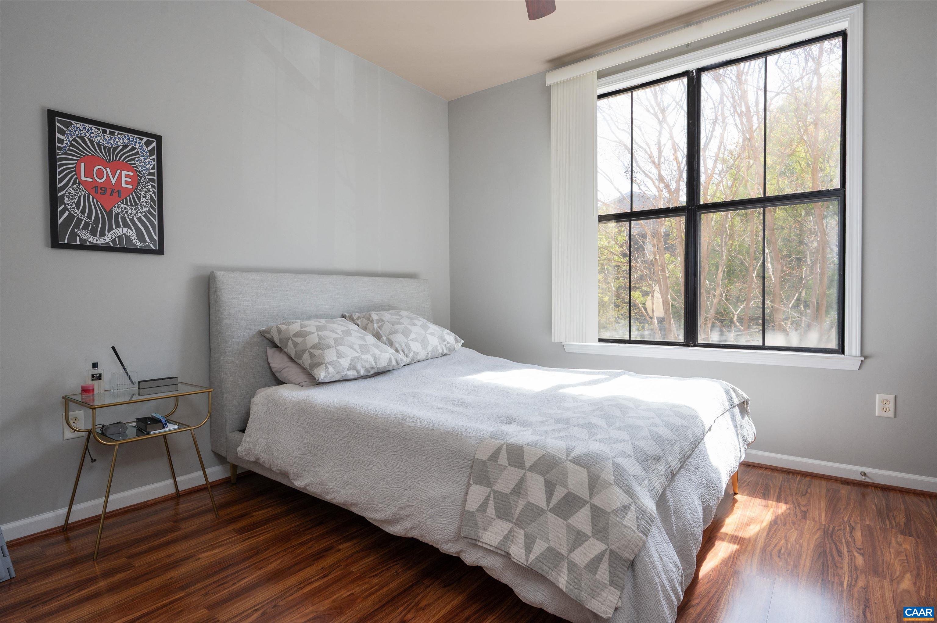 735 Walker Square, Unit 2A Charlottesville, VA 22903 - Photo 8 of 30 a bedroom with a bed and a window