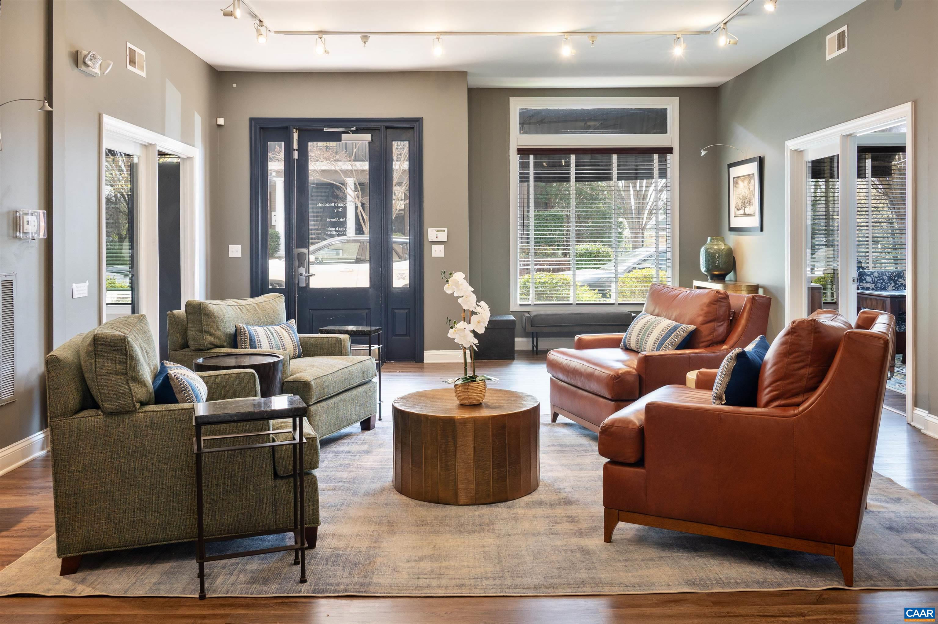735 Walker Square, Unit 2A Charlottesville, VA 22903 - Photo 10 of 30 a living room with furniture and large windows