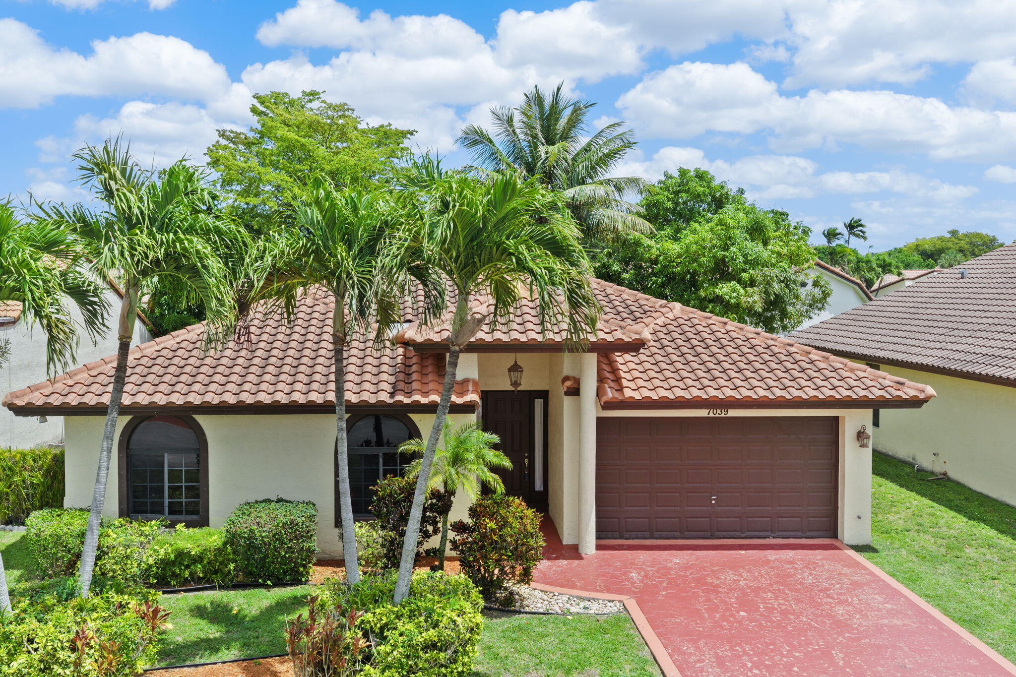 7039 Golf Pointe Circle Tamarac, FL 33321 - Photo 1 of 34 Front