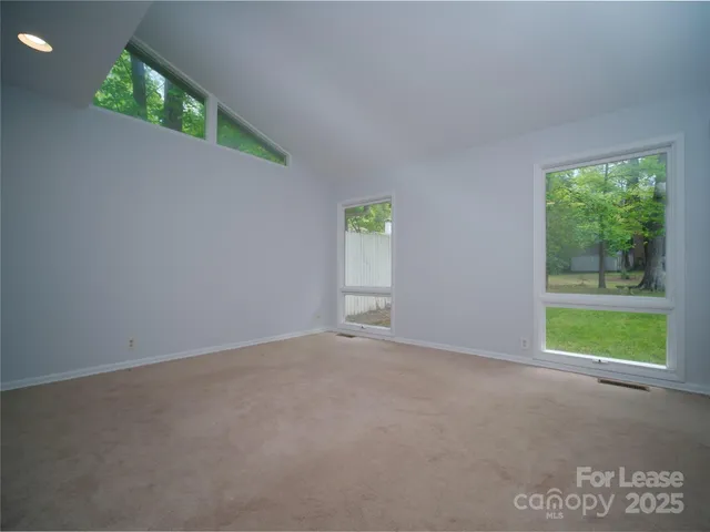 an empty room with windows