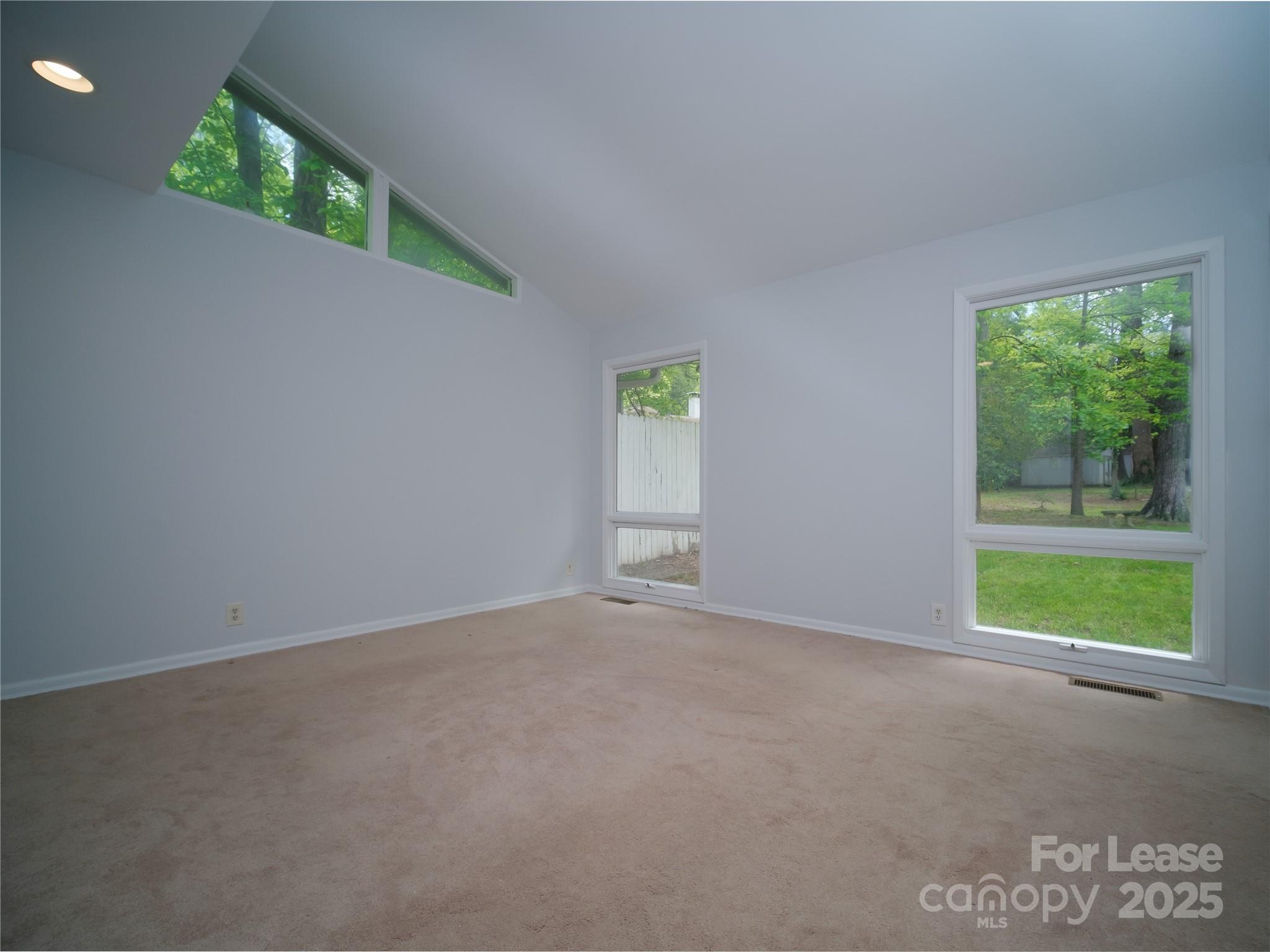 1123 Lynbrook Drive Charlotte, NC 28211 - Photo 12 of 47 an empty room with windows
