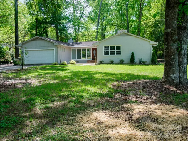 a house view with a backyard space