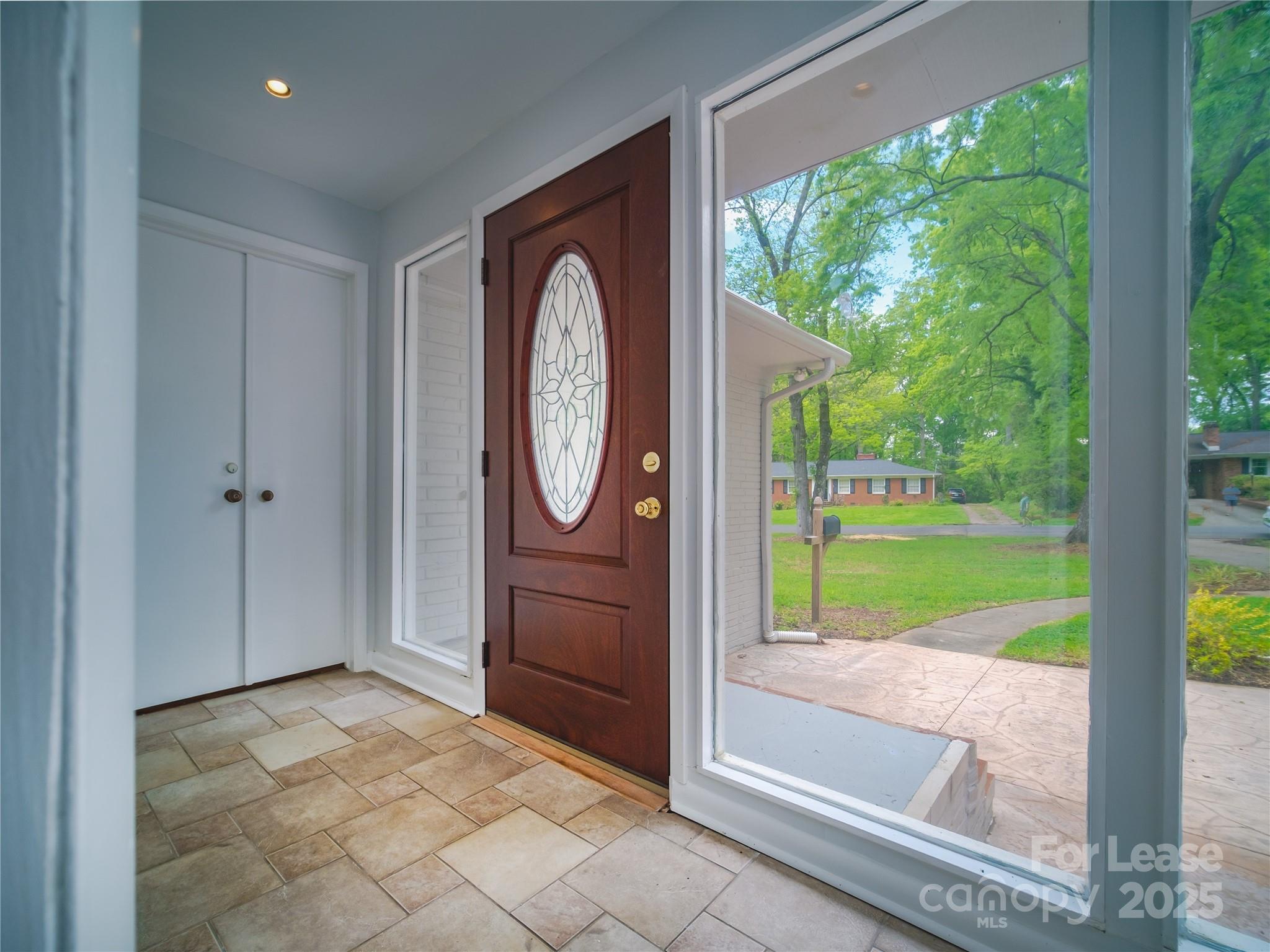 1123 Lynbrook Drive Charlotte, NC 28211 - Photo 6 of 47 a front view of a house with garden