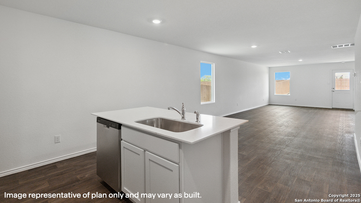 5007 Gecko Converse, TX 78109 - Photo 11 of 72 a kitchen with a sink and cabinets