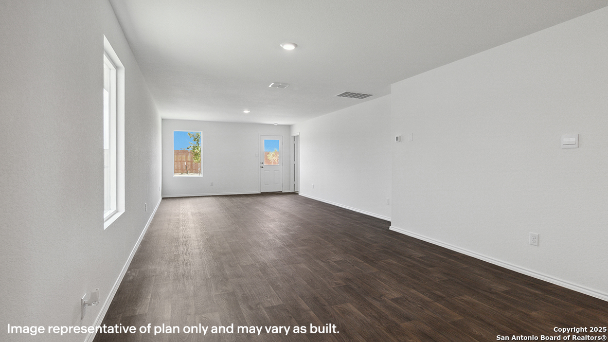 5007 Gecko Converse, TX 78109 - Photo 15 of 72 an empty room with wooden floor and windows