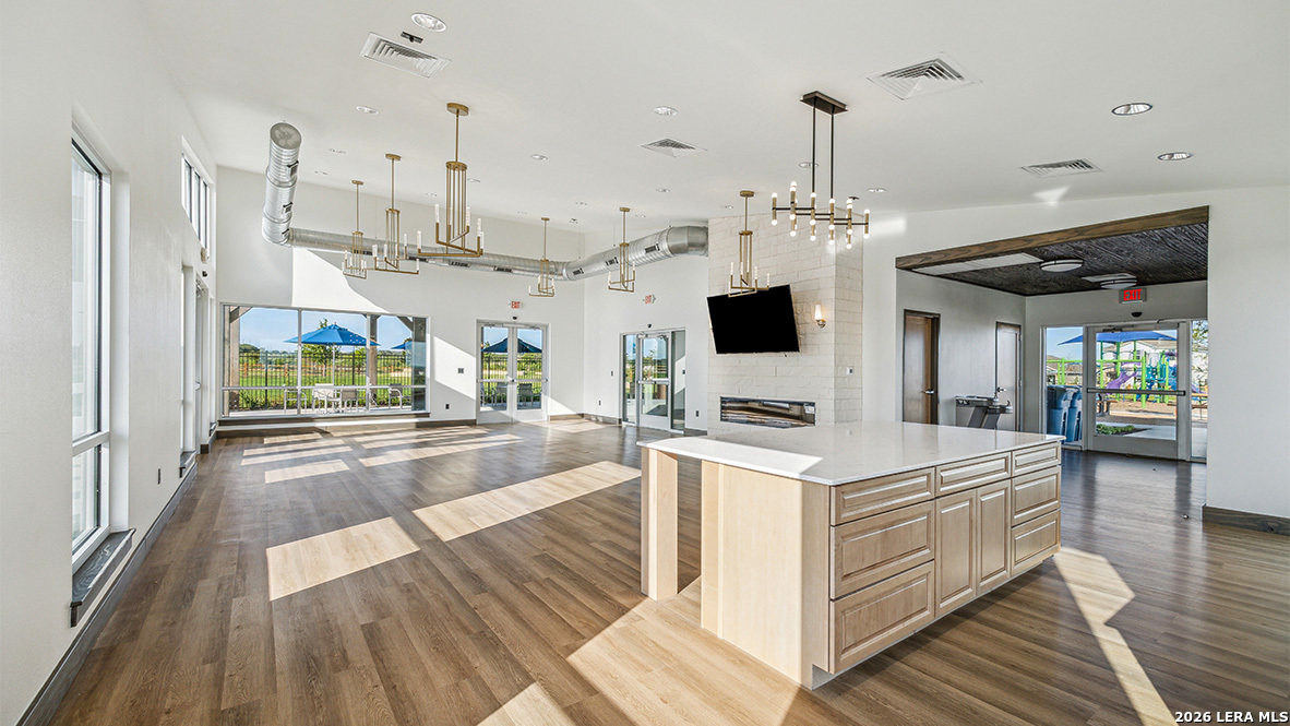 5007 Gecko Converse, TX 78109 - Photo 51 of 72 a view of living room kitchen with stainless steel appliances granite countertop living room view and living room view