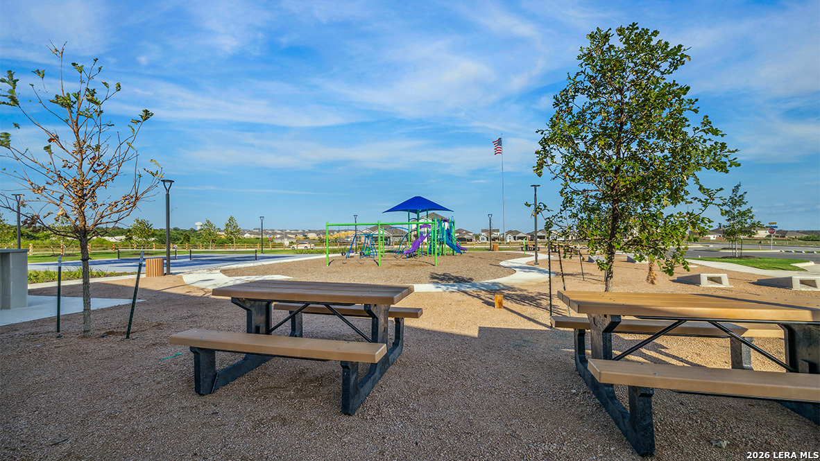 5007 Gecko Converse, TX 78109 - Photo 65 of 72 a view of swimming pool with outdoor seating and trees in the background