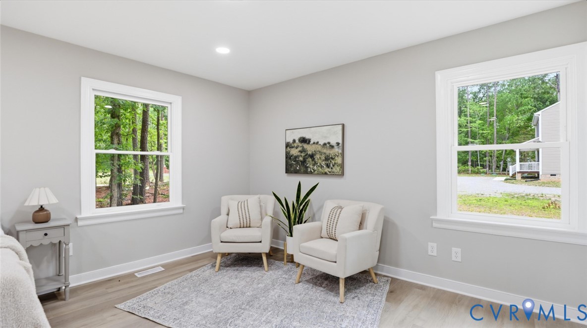 3200 Portugee Road Sandston, VA 23150 - Photo 18 of 26 a living room with furniture and a window