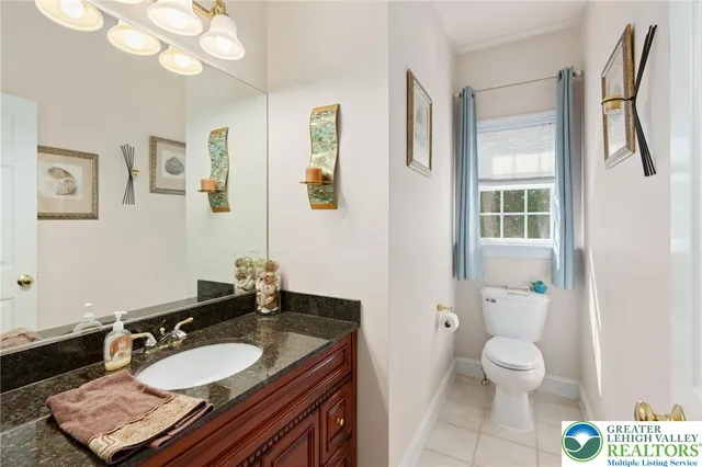 a bedroom with a bed and a dresser in it