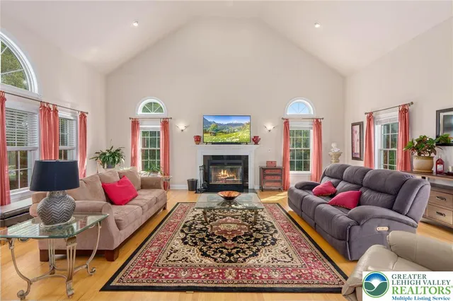 a living room with furniture or couch and a fireplace