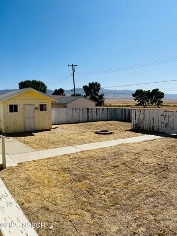 a view of a swimming pool with an ocean view