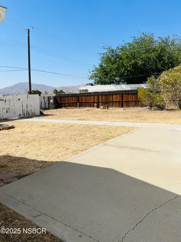 a view of a terrace with a lake view