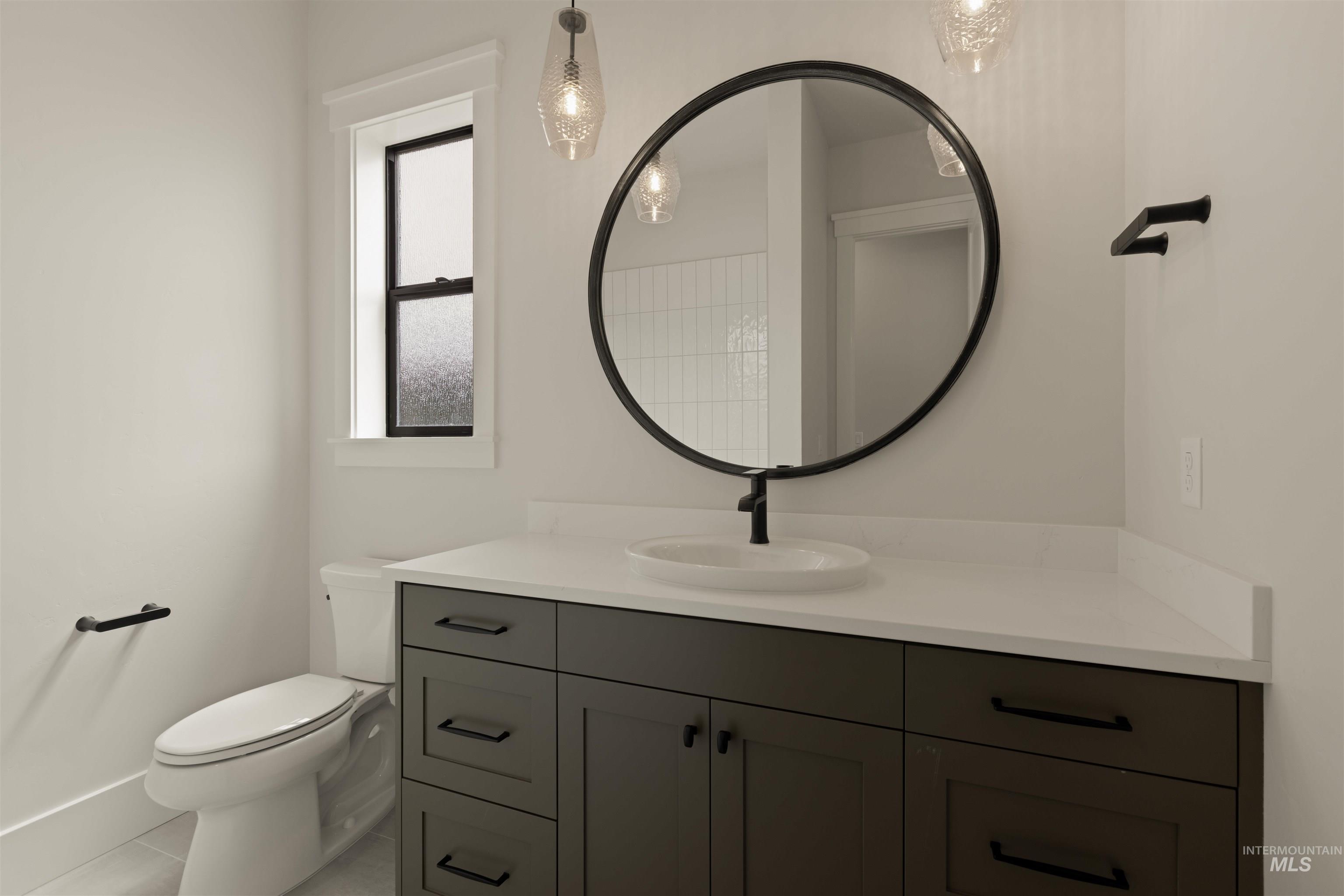 2595 East Tenzing Drive Meridian, ID 83642 - Photo 28 of 32 Bathroom with vanity and tile patterned floors