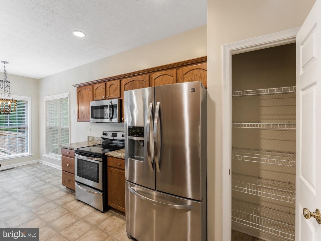 235 Cedar Ridge Drive Ruther Glen, VA 22546 - Photo 11 of 27 SS appliances.