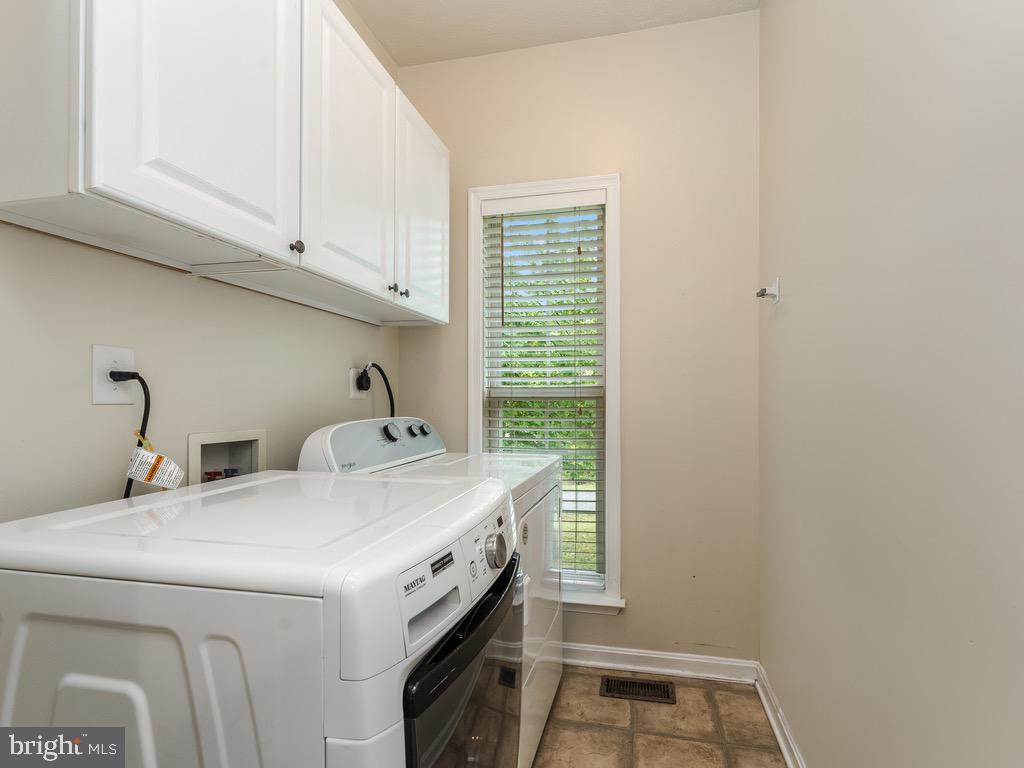 235 Cedar Ridge Drive Ruther Glen, VA 22546 - Photo 17 of 27 Laundry room off kitchen.