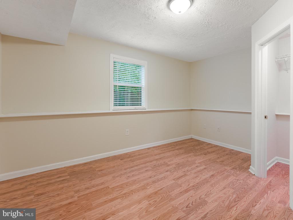 235 Cedar Ridge Drive Ruther Glen, VA 22546 - Photo 21 of 27 LL bedroom.