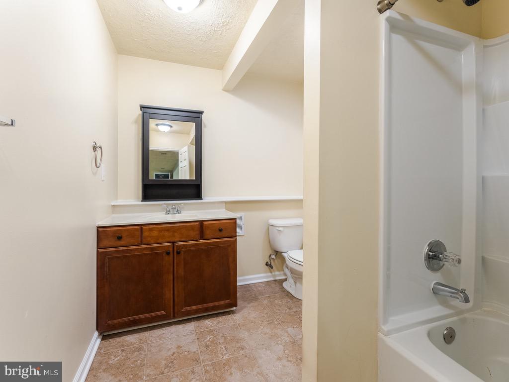 235 Cedar Ridge Drive Ruther Glen, VA 22546 - Photo 23 of 27 LL bathroom.