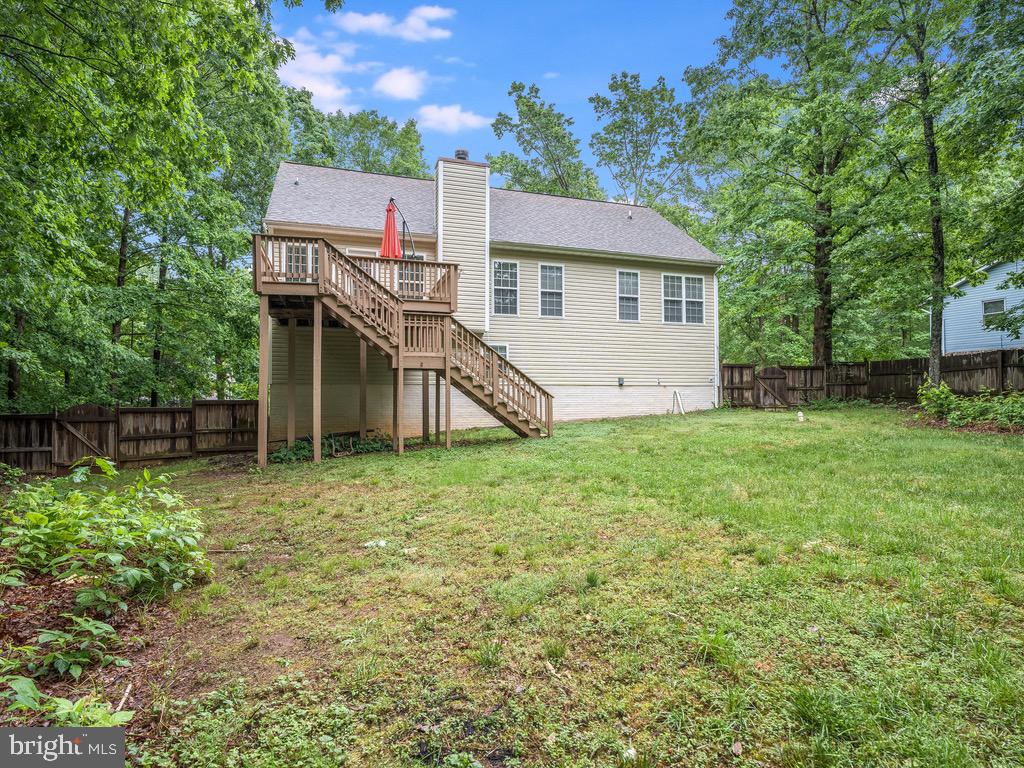 235 Cedar Ridge Drive Ruther Glen, VA 22546 - Photo 3 of 27 Deck and fenced yard.