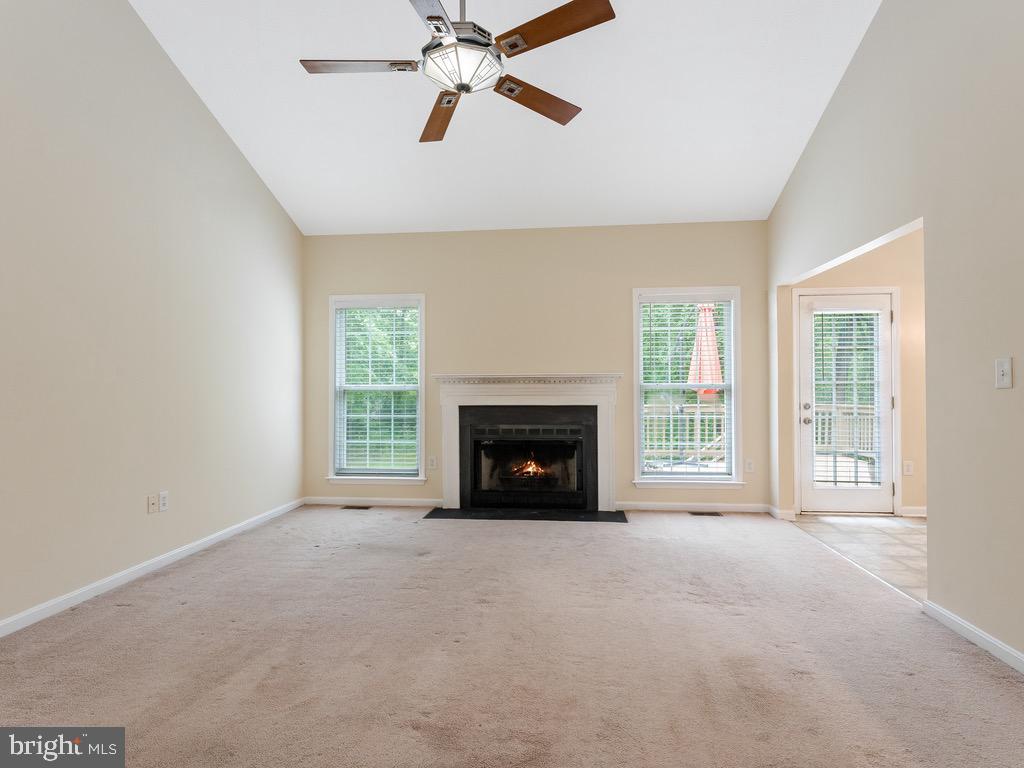 235 Cedar Ridge Drive Ruther Glen, VA 22546 - Photo 7 of 27 Large living room with wood burning FP.