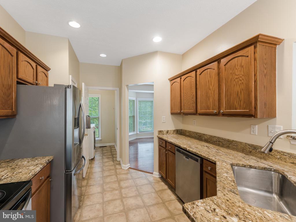 235 Cedar Ridge Drive Ruther Glen, VA 22546 - Photo 10 of 27 Granite in kitchen.