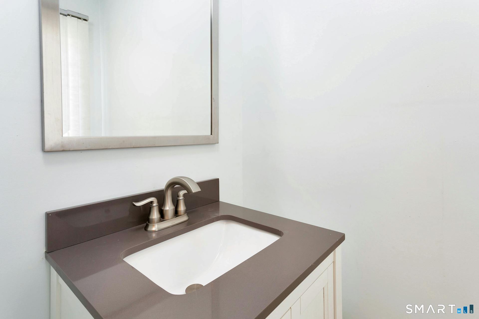 192 Frenchtown Road Bridgeport, CT 06606 - Photo 8 of 28 Powder Room tucked away behind kitchen