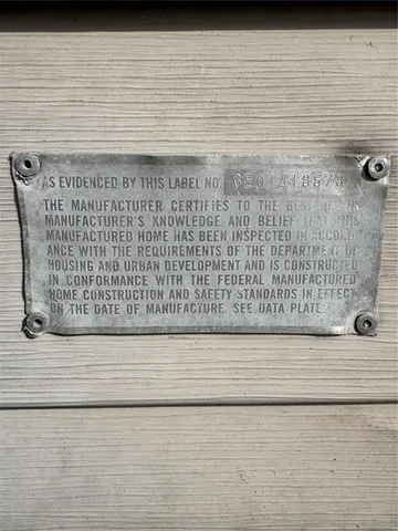 a view of a patio with wooden floor