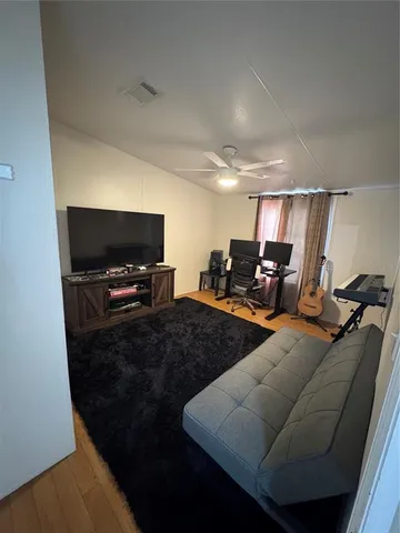 a dining room with kitchen island a table and chairs