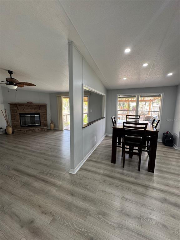 18806 Monroe Avenue Orlando, FL 32820 - Photo 28 of 44 a view of a dining room with furniture and window