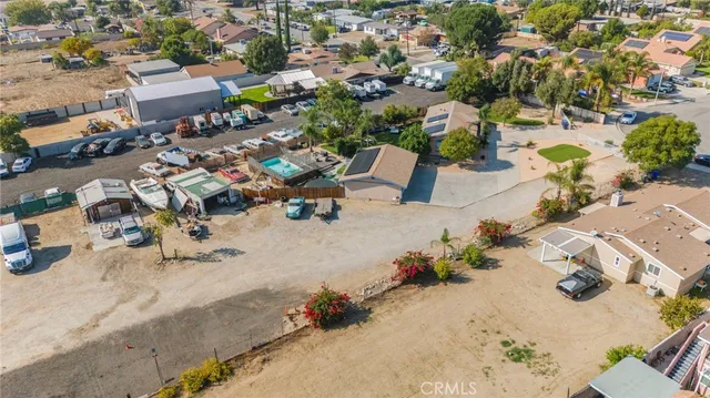 a view of a backyard with sitting area