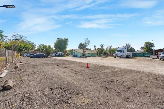 a view of a backyard with a tv