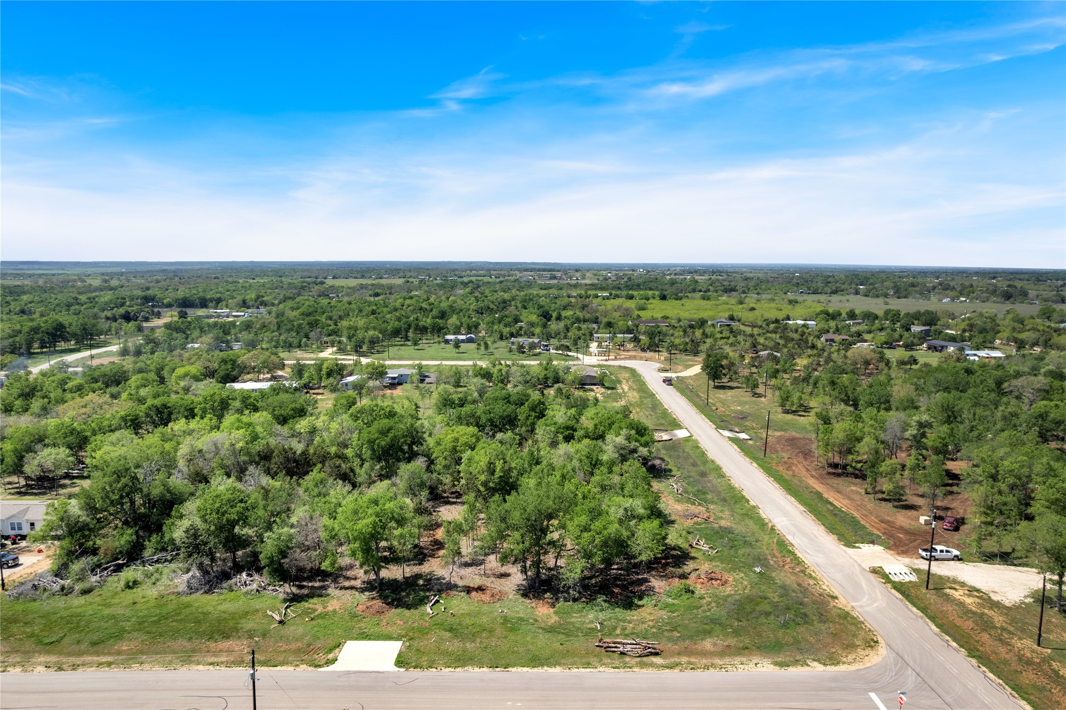 112 Empire Street Elgin, TX 78621 - Photo 5 of 22 Aerial view with a forest view