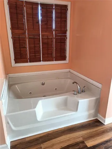 a bathroom with a sink and a bathtub